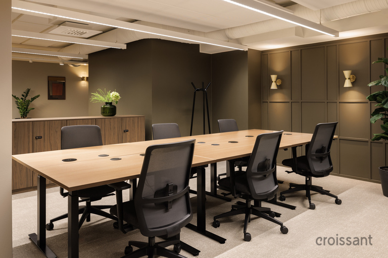 a conference room with chairs and a table