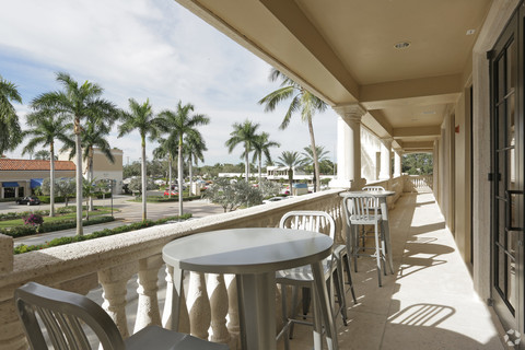 a dining room table in front of a building