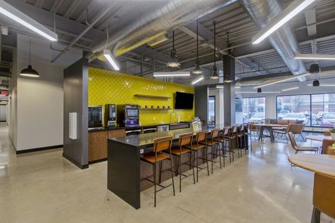 a kitchen with a table in a room