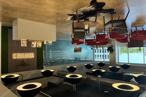 a room with chairs and tables