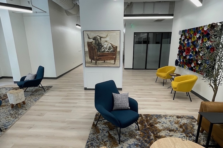 a room filled with furniture and a fireplace