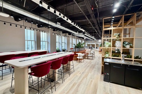 a room with tables and chairs