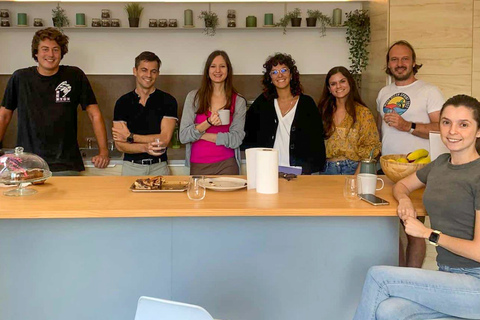 a group of people sitting at a table posing for the camera