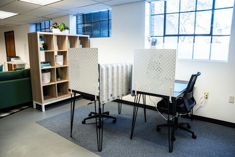 a room with chairs and a table
