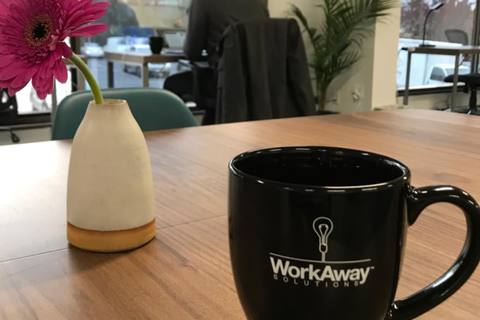 a cup of coffee on a table