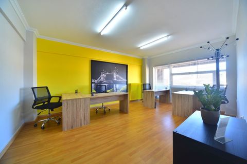 a living room filled with furniture on top of a hard wood floor