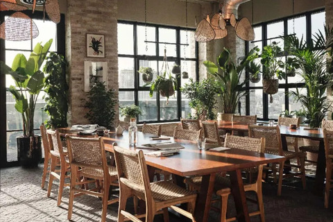 a dining room table in front of a building