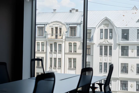 a chair sitting in front of a building