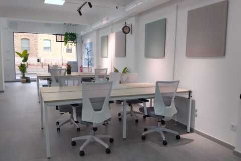 a room with a table and chairs