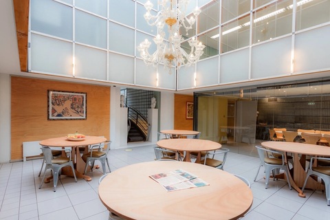 a room with tables and chairs