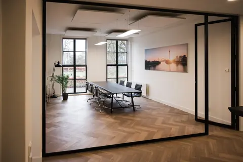 a room with a table and chairs