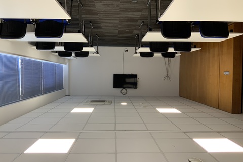 a room filled with furniture and a flat screen tv