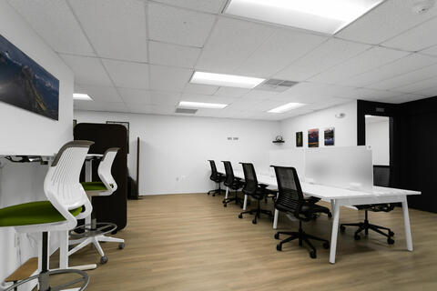 a room filled with furniture and a table