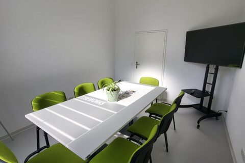 a green chair in a room