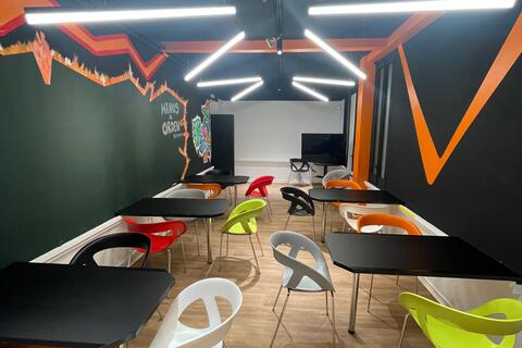 Ibiza ( up to 24 in theatre formation, or 14 with tables)